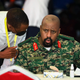 Then Lt. Gen. Muhoozi Kainerugaba, right, son of Uganda’s President Yoweri Museveni, speaks to Attorney General Kiryowa Kiwanuka, left, at a “thanksgiving” ceremony in Entebbe, Uganda on May 7, 2022. Uganda’s President Yoweri Museveni fired his son Muhoozi Kainerugaba as commander of the nation’s infantry forces Tuesday, Oct. 4, 2022 after the son tweeted an unprovoked threat to capture the capital of neighboring Kenya, drawing widespread concern in East Africa.